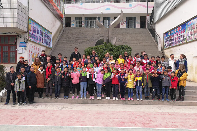 Overseas volunteers with high school students in remote regions of China