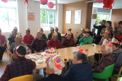 Elderly at Amity's elderly home celebrating a birthday party